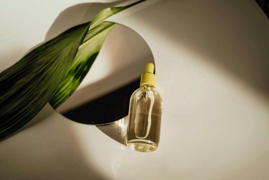 Bottle of snail mucin serum with dropper, showcasing Korean skincare ingredient and global skincare secrets.