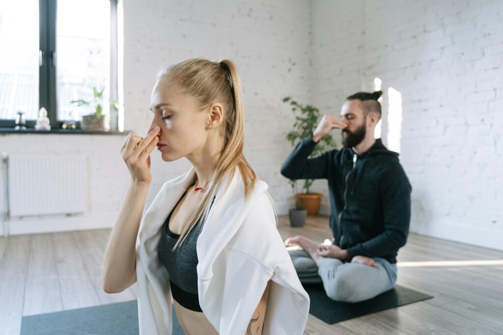 2 Person practicing mindfulness or self-care in a cozy, relaxing environment during the holidays.