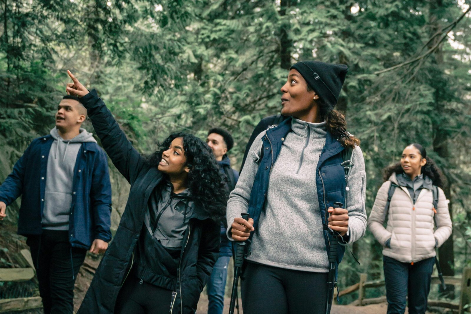 Family enjoying a holiday-themed outdoor game, demonstrating fun ways to stay active and healthy during the festive season.