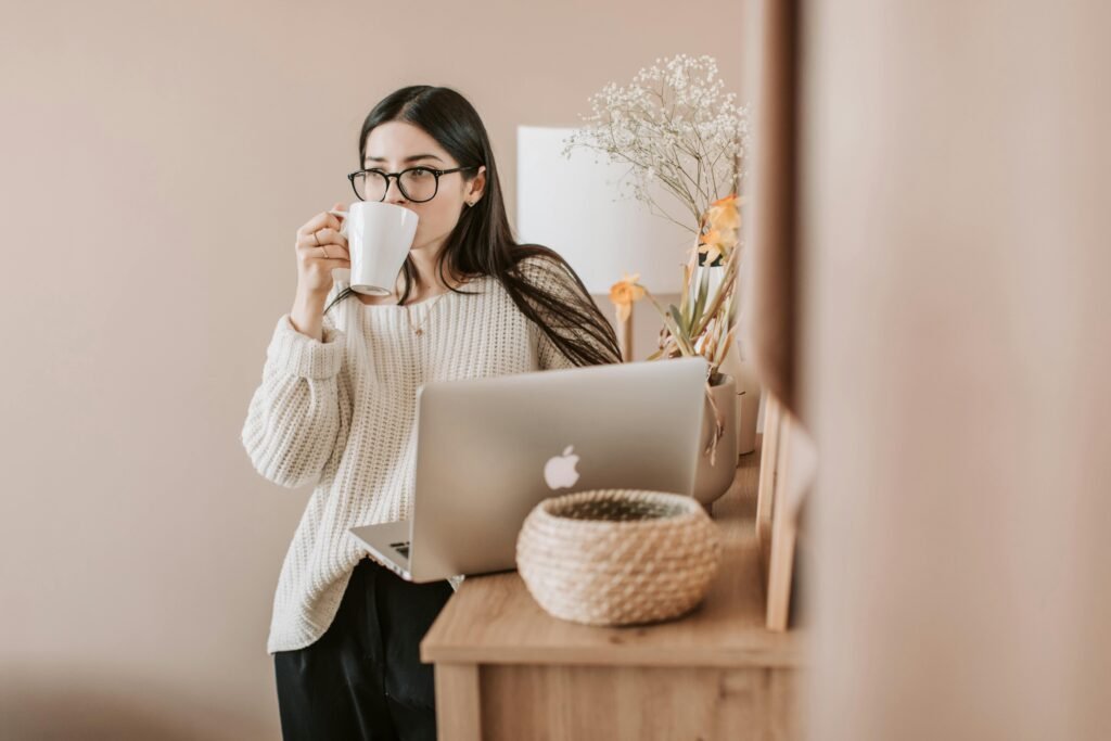 A girl drinking a Cup of Rooibos tea.