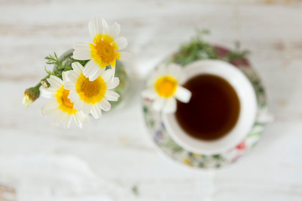 Chamomile flowers and tea for gentle acne treatment