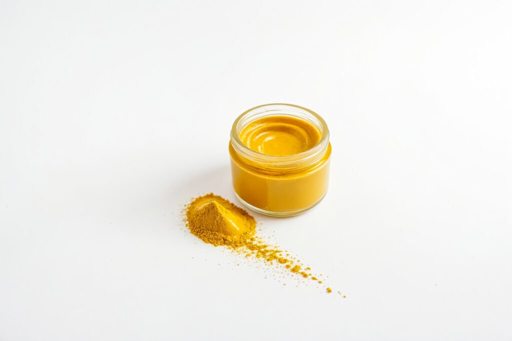 Homemade face masks for healthy skin with a natural skin care mask made from turmeric and milk.