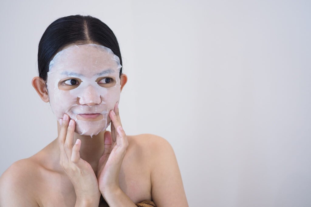 Variety of sheet masks in packaging, a staple in South Korean skincare routines.