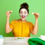 A woman applying a homemade face mask for clear skin, showcasing natural skincare remedies for a glowing complexion.